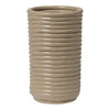 Beige ceramic vase with vertical ribbed texture and smooth, glossy finish. Perfect for modern decor.