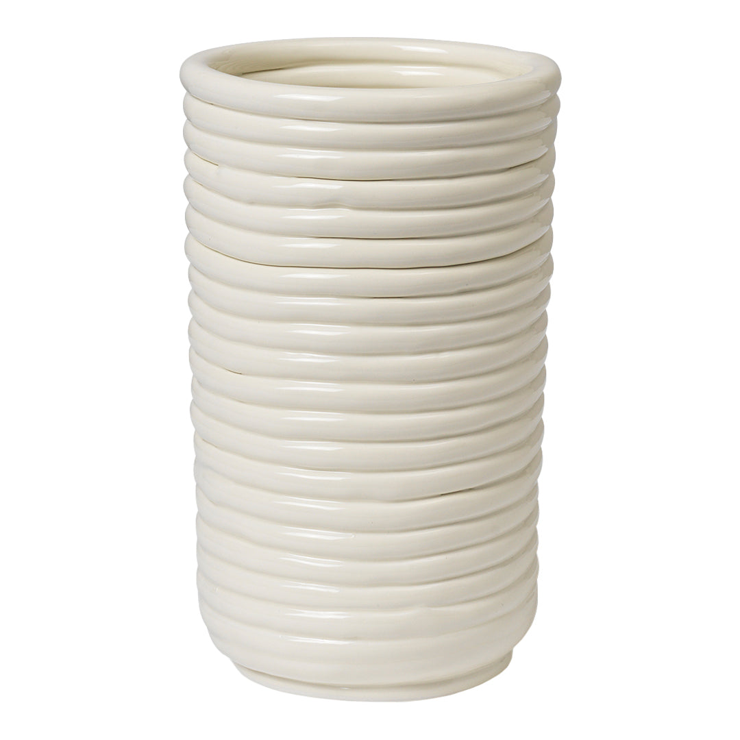 White ceramic vase with a ribbed texture and smooth, glossy finish. Elegant and modern design for home decor.