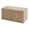 Light oak storage cabinet with a minimalist design and smooth, natural wood grain texture. Perfect for modern interiors.
