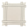 Cream square pillow with a minimalist black grid pattern and tie accents. Perfect for modern decor styling.