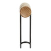Natural wood grain on a round top with a sleek black metal stand, combining rustic charm and modern design.