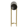 Modern black and gold candle holder with sleek cylindrical design and smooth metallic finish.