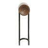Modern lamp with a smooth tan shade, dark wood accent, and sleek black metal base. Stylish and minimalist design.