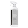 White spray bottle with a sleek gray label and black accents, showcasing a minimalist design.