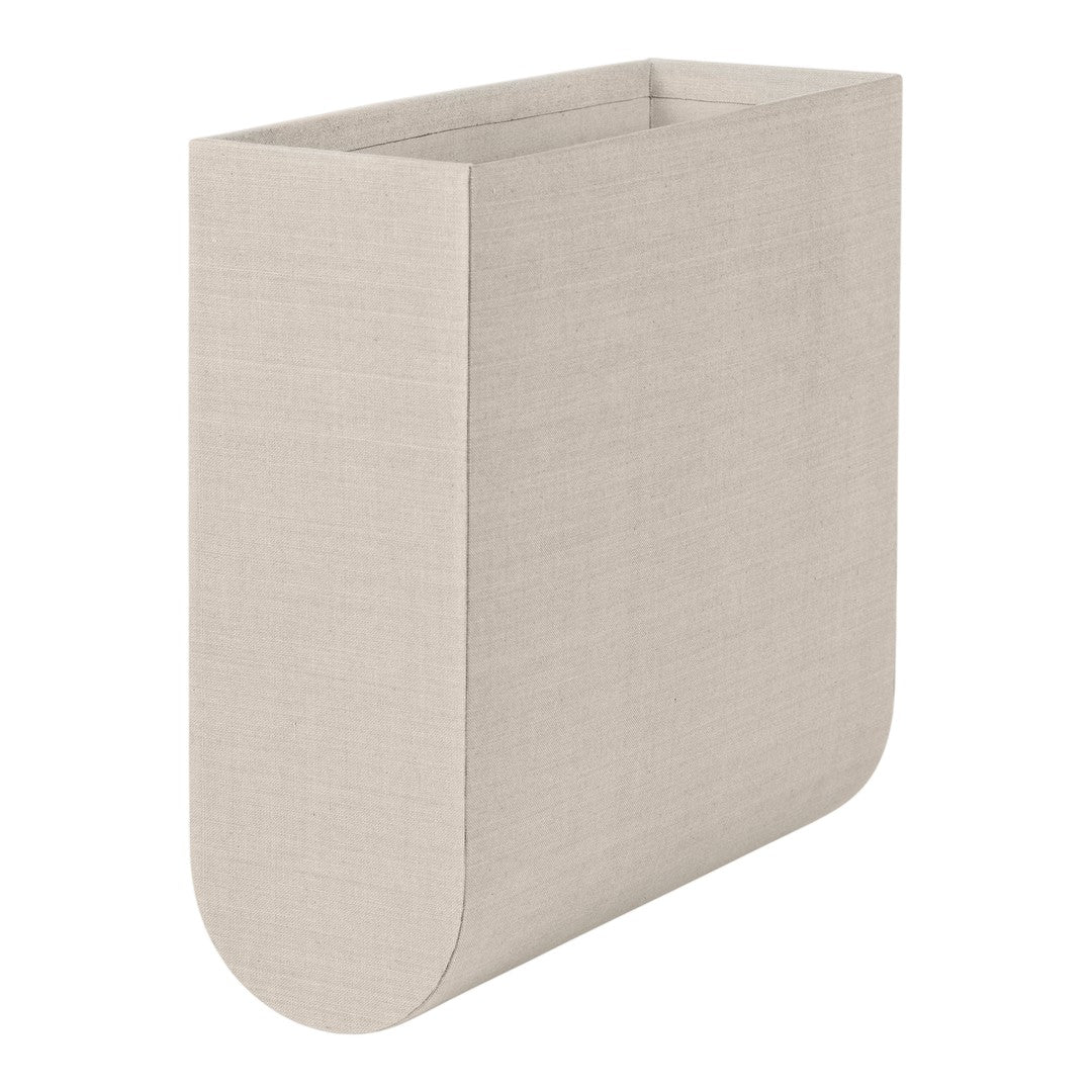 Beige fabric wall organizer with a smooth, minimalist design and rounded edges, perfect for modern decor.