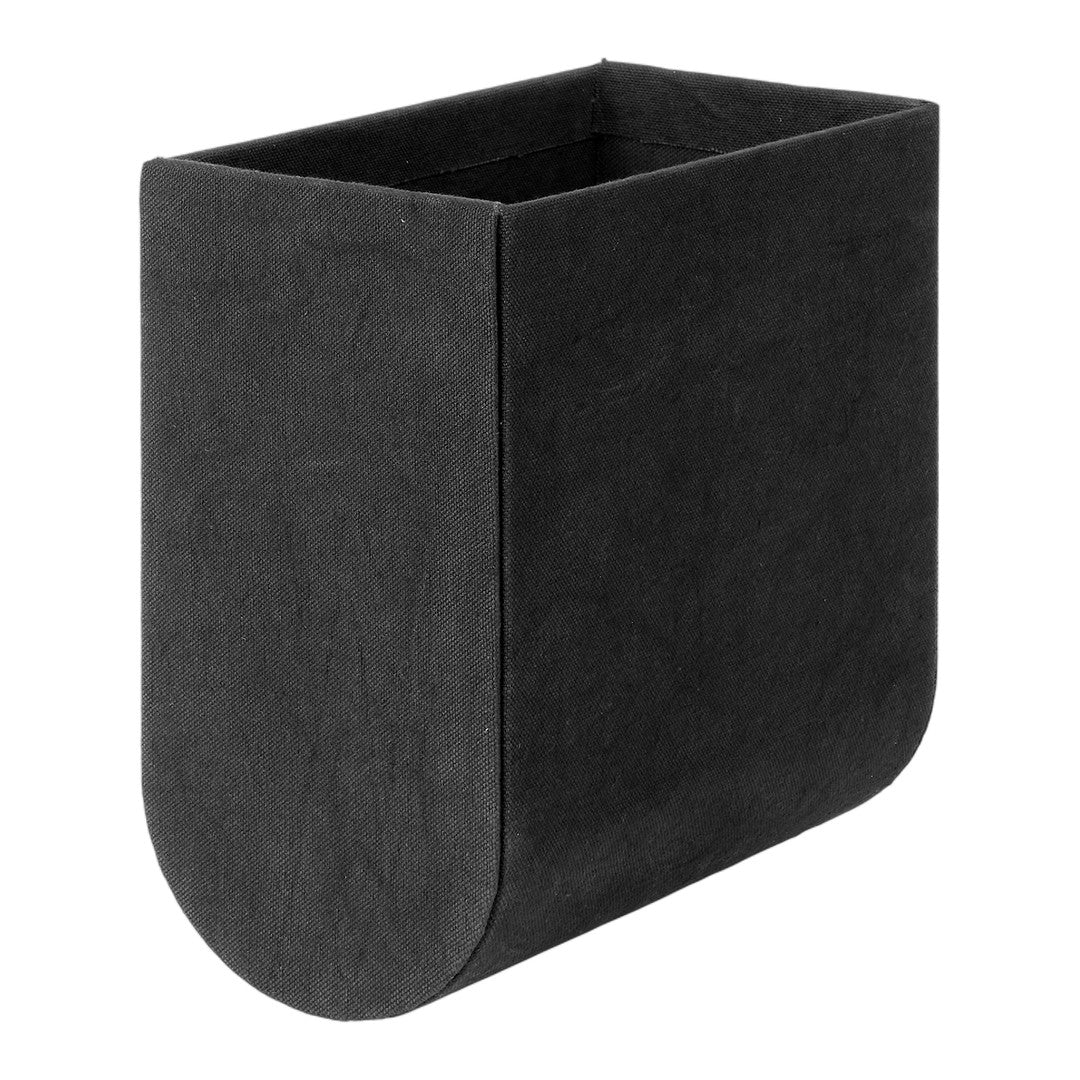 Sleek black storage container with a smooth, minimalist design and rounded base, perfect for modern decor.