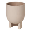 Simple beige planter pot with a textured finish and minimalist design, supported by two sturdy legs.