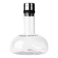 Clear glass carafe with a sleek black and silver metal cap, featuring a modern, minimalist design.