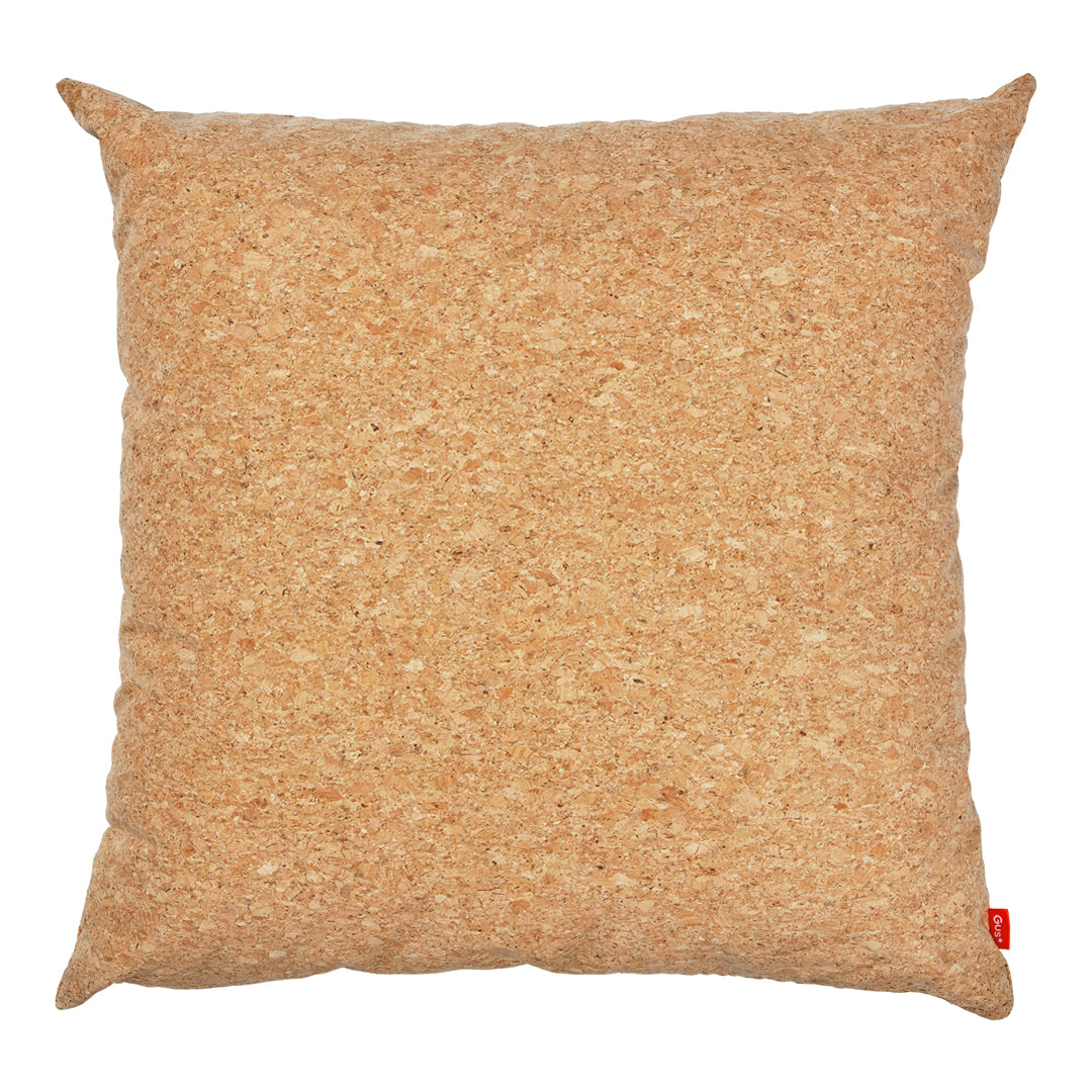 Tan textured throw pillow with a natural, earthy look and subtle flecks throughout. Perfect for modern décor.