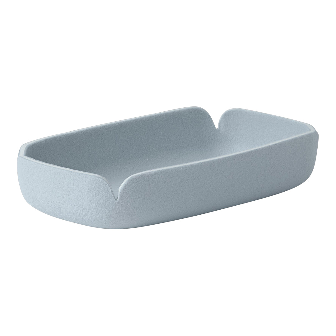Light blue textured tray with a soft, rounded design, perfect for stylish organization. Ideal for modern decor.