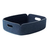 Navy felt storage basket with white stitching and rounded edges for a modern, stylish touch. Perfect for organization.