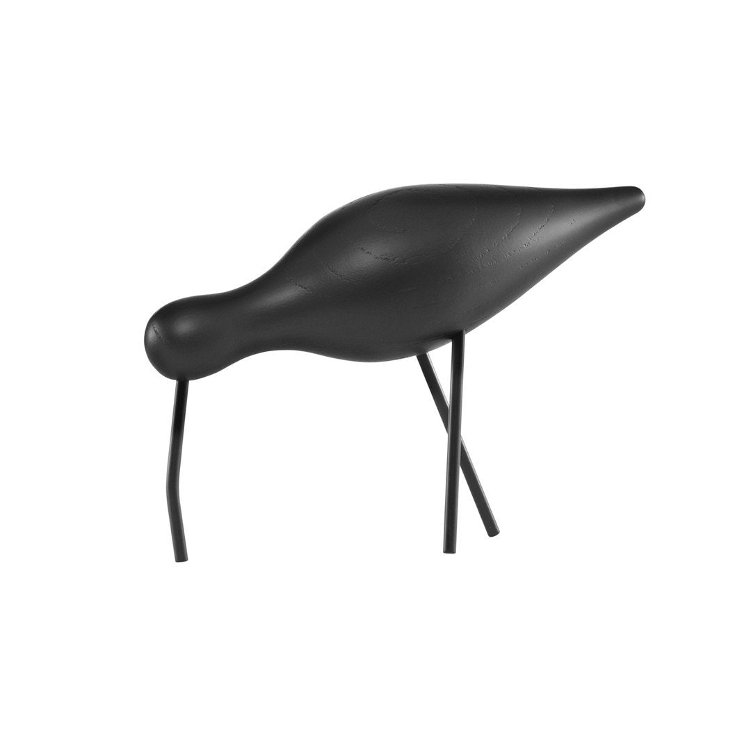 Black decorative bird sculpture with smooth, sleek contours and minimalistic design, perfect for modern decor.