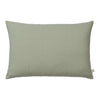 Solid sage green pillow with a smooth texture, perfect for adding a touch of elegance to any decor.