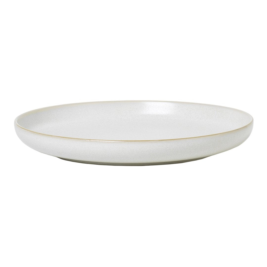 White ceramic plate with a subtle gold rim and smooth, minimalist design, perfect for elegant dining.