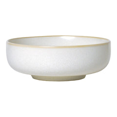White ceramic bowl with a subtle speckled pattern and a chic gold rim. Perfect for elegant dining.