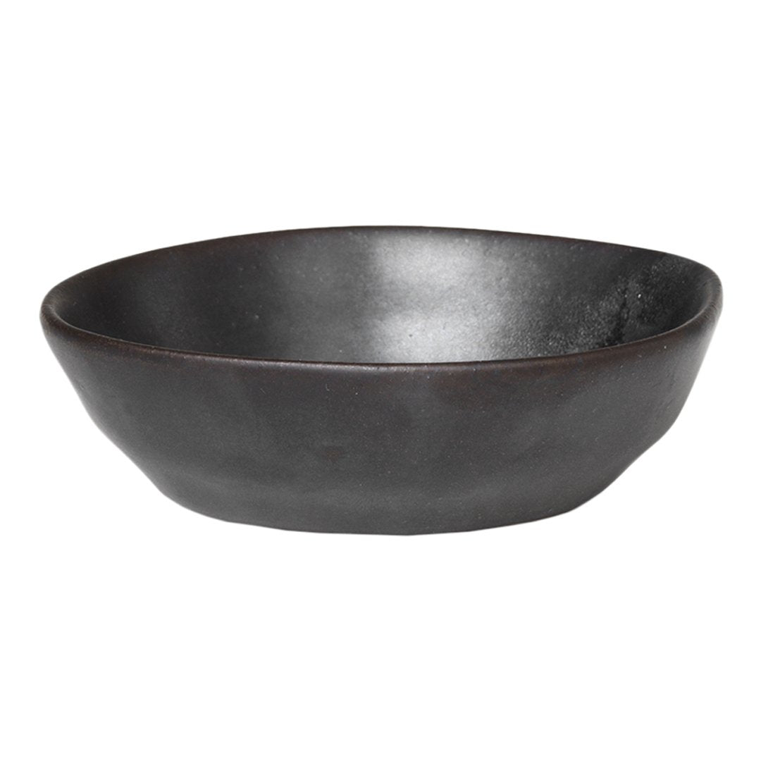 Handcrafted black ceramic bowl with a smooth, matte finish and a minimalist design. Perfect for modern dining.