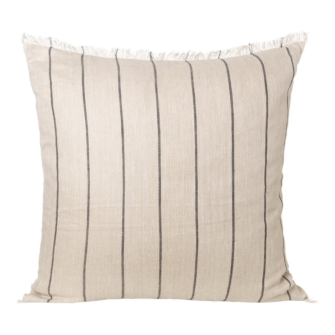 Beige pillow with vertical black stripes and fringe detailing for a textured, modern look. Perfect for any decor.