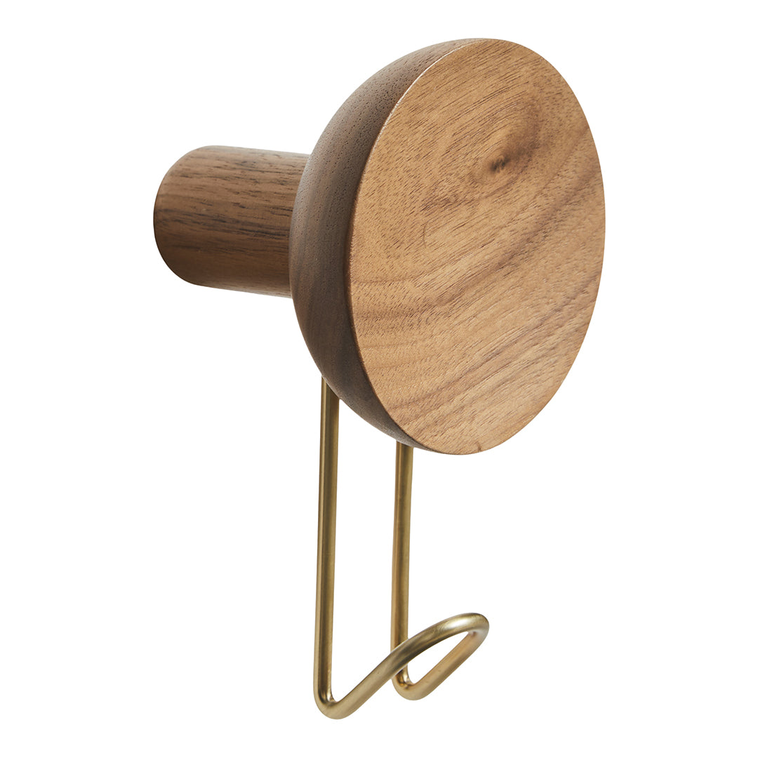 Round wooden hook in natural wood grain finish with a sleek brass metal hook. Stylish and modern design.