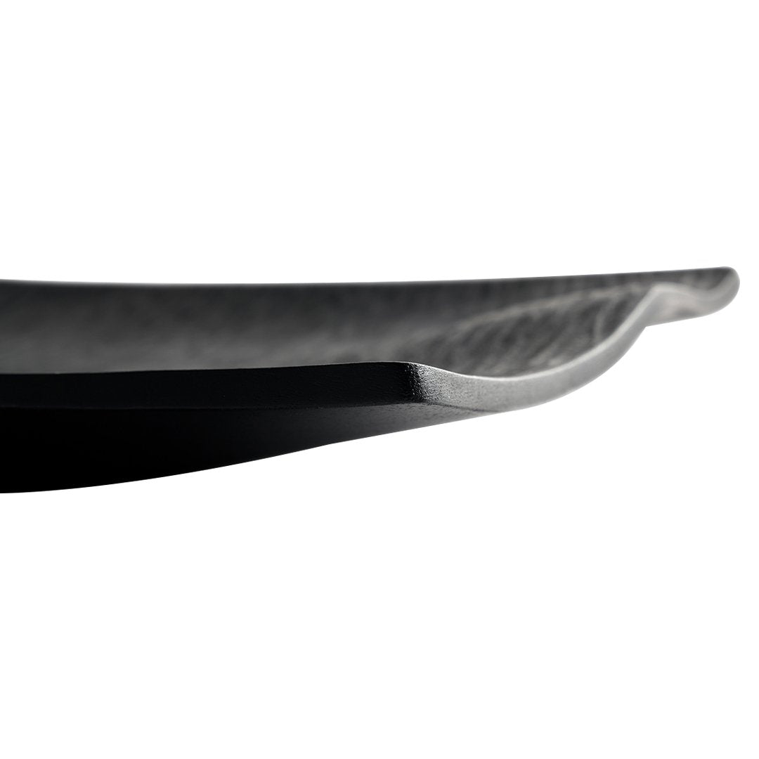 Sleek black serving dish with a smooth, curved edge and subtle metallic sheen. Ideal for modern table settings.