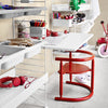 Bright red chair paired with white desk and shelving; playful storage with vibrant colors, evoking a cheerful atmosphere.