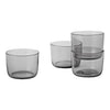 Set of four sleek, smoky gray glass cups with a modern, minimalist design. Perfect for elegant dining.