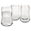 Set of four clear, curved drinking glasses showcasing smooth, transparent design with no patterns or colors.
