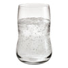 Clear glass tumbler filled with sparkling water, showcasing bubbles and a smooth, curved silhouette.