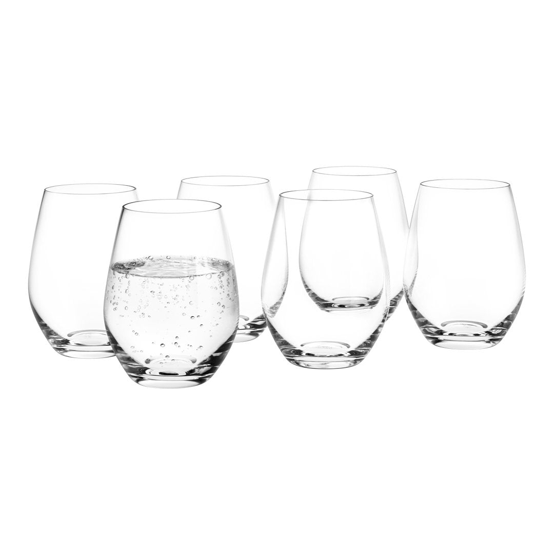Set of six clear glass tumblers featuring a smooth finish and varying shapes, perfect for any table setting.