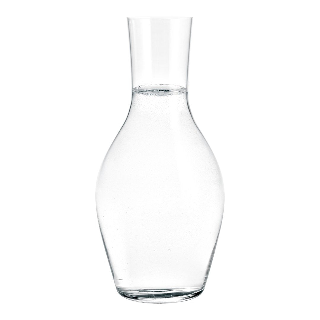 Clear glass water carafe with a smooth, elegant shape and no patterns. Perfect for any table setting. 