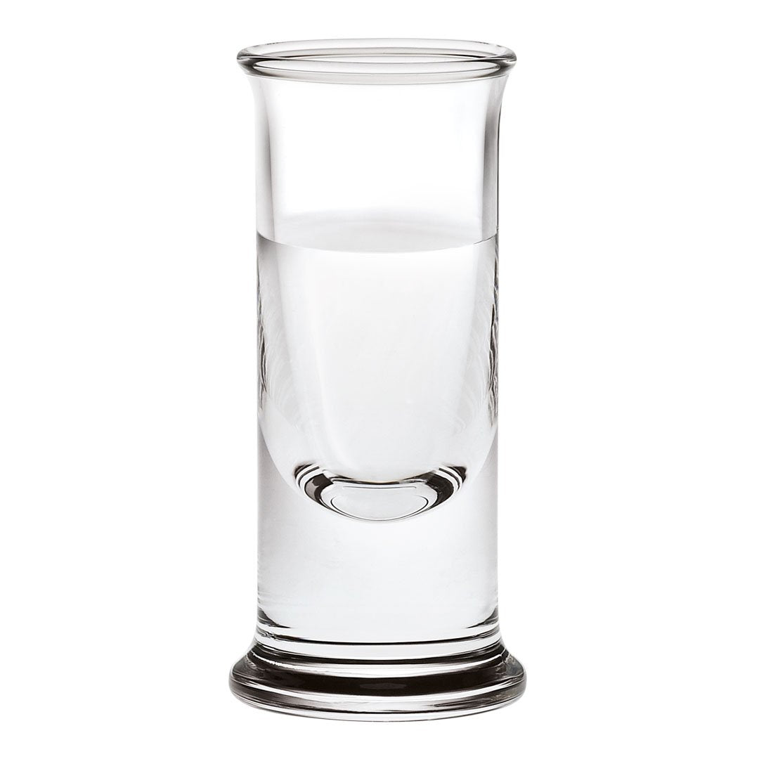 Clear glass shot glass with a smooth, modern design and subtle curves, ideal for serving drinks.
