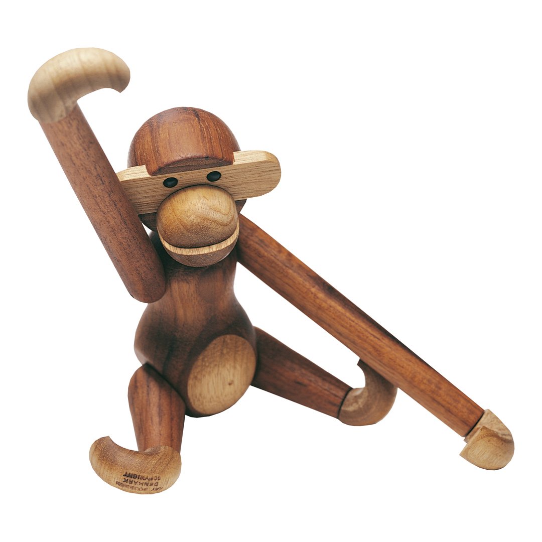 Wooden monkey figurine featuring a natural wood finish with light and dark brown tones and smooth rounded shapes.