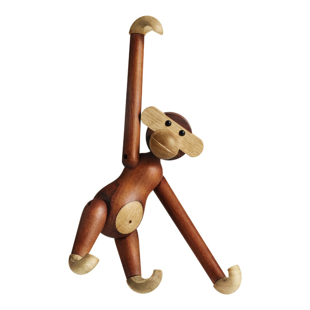 Wooden monkey figurine with a warm brown finish and light beige accents, showcasing a whimsical design.