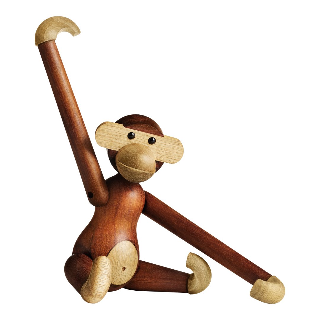 Wooden monkey figurine with warm brown tones and light beige accents, featuring a playful pose and smooth finish.