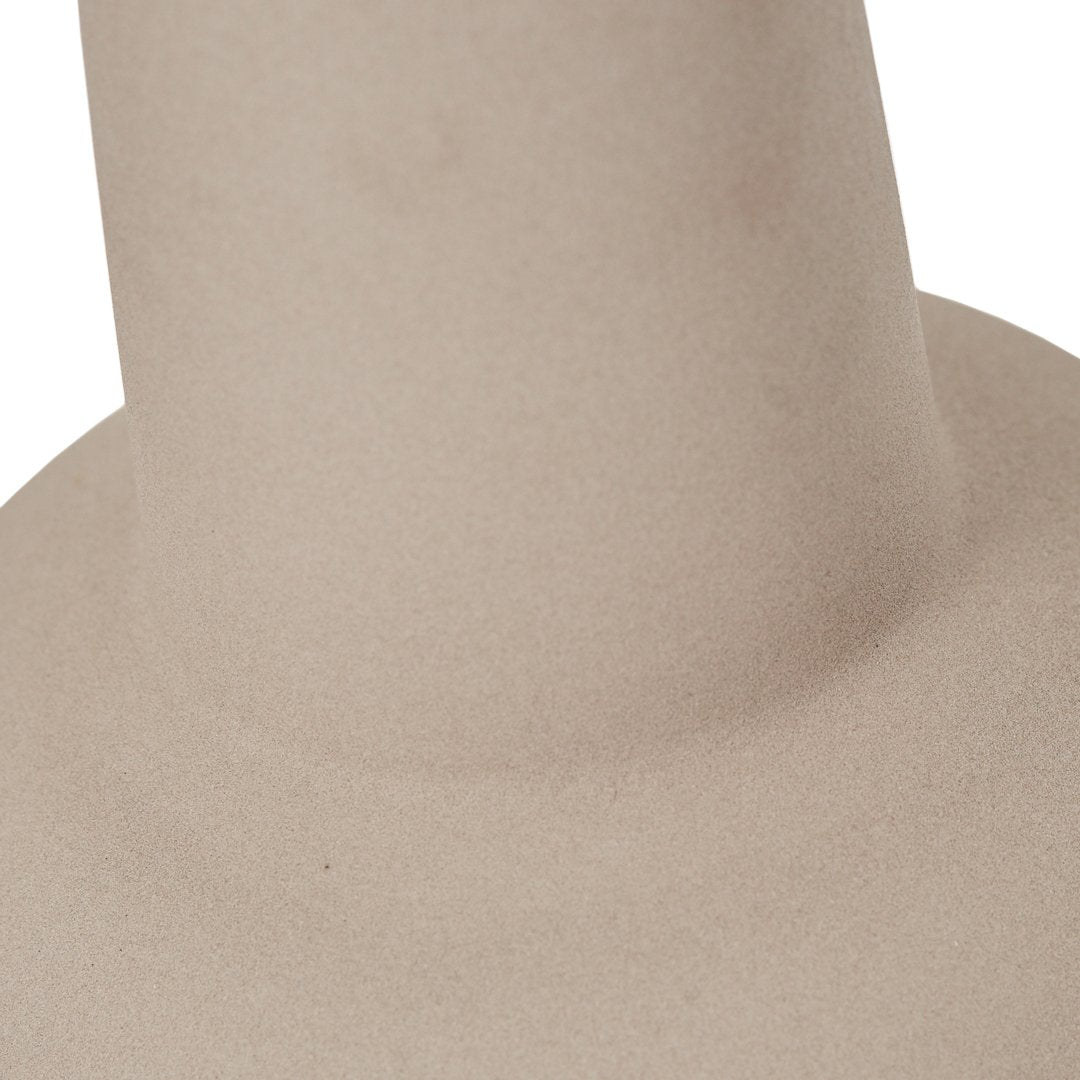 Beige textured surface with a smooth finish, showcasing a minimalistic design perfect for modern decor.