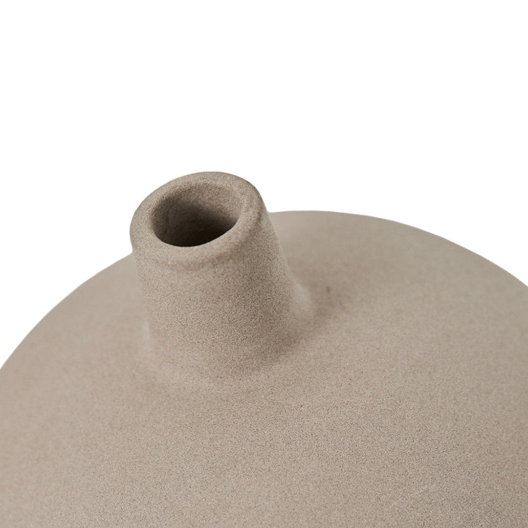 Natural beige pottery vase with a smooth, matte texture and subtle rounded shape, featuring a narrow neck.