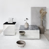 Modern decor with gray marble, black accents, and soft beige tones in minimalist style. Perfect for contemporary spaces.