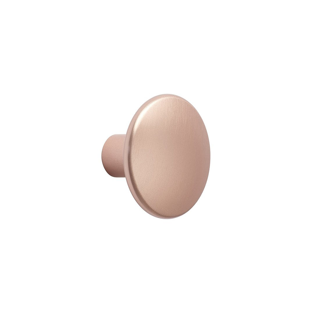Sleek round drawer knob in soft rose gold finish, smooth surface with a contemporary matte texture.