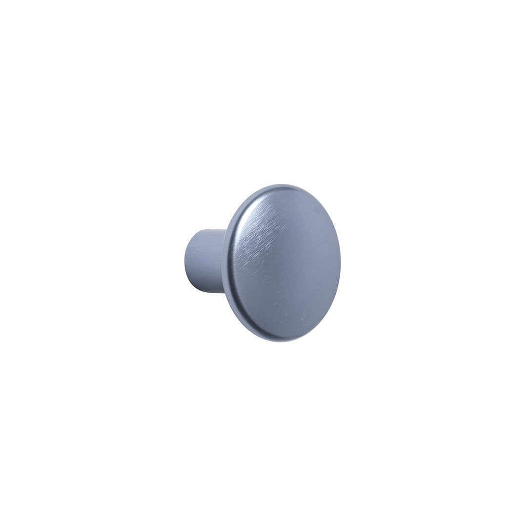 Smooth, round, light gray knob with a subtle texture, perfect for modern decor.