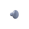 Smooth, round, light gray knob with a subtle texture, perfect for modern decor.