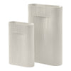 Textured white ceramic vases with vertical ribbed patterns, available in two sizes for stylish decor.