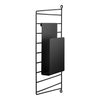 Black metal wall organizer with a sleek, grid pattern and matte finish for modern decor.