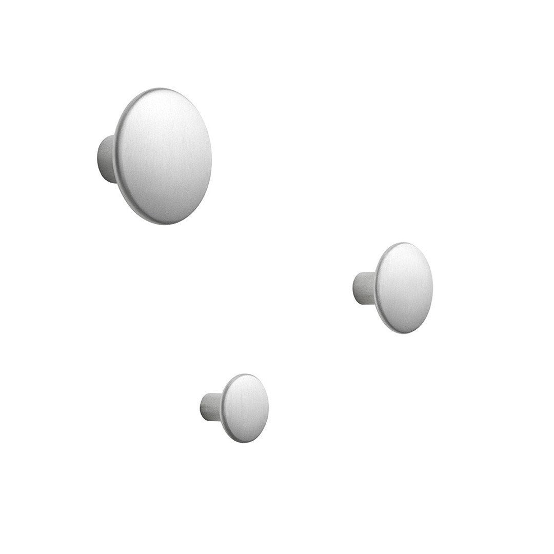 Three sleek, round wall hooks in a glossy white finish, showcasing a clean and minimalist design.