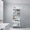 White shelving unit with glass accents against a sleek gray marble bathroom backdrop, featuring minimalistic decor.