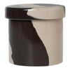 Ceramic storage jar in beige and black with abstract brushstroke pattern. Modern and stylish decor accent.