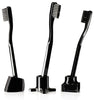 Set of three black toothbrushes with sleek designs and varying ergonomic shapes. Elegant and modern aesthetic.