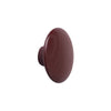 Deep maroon oval knob with a smooth, glossy finish and subtle wood-like texture. Perfect for modern decor.